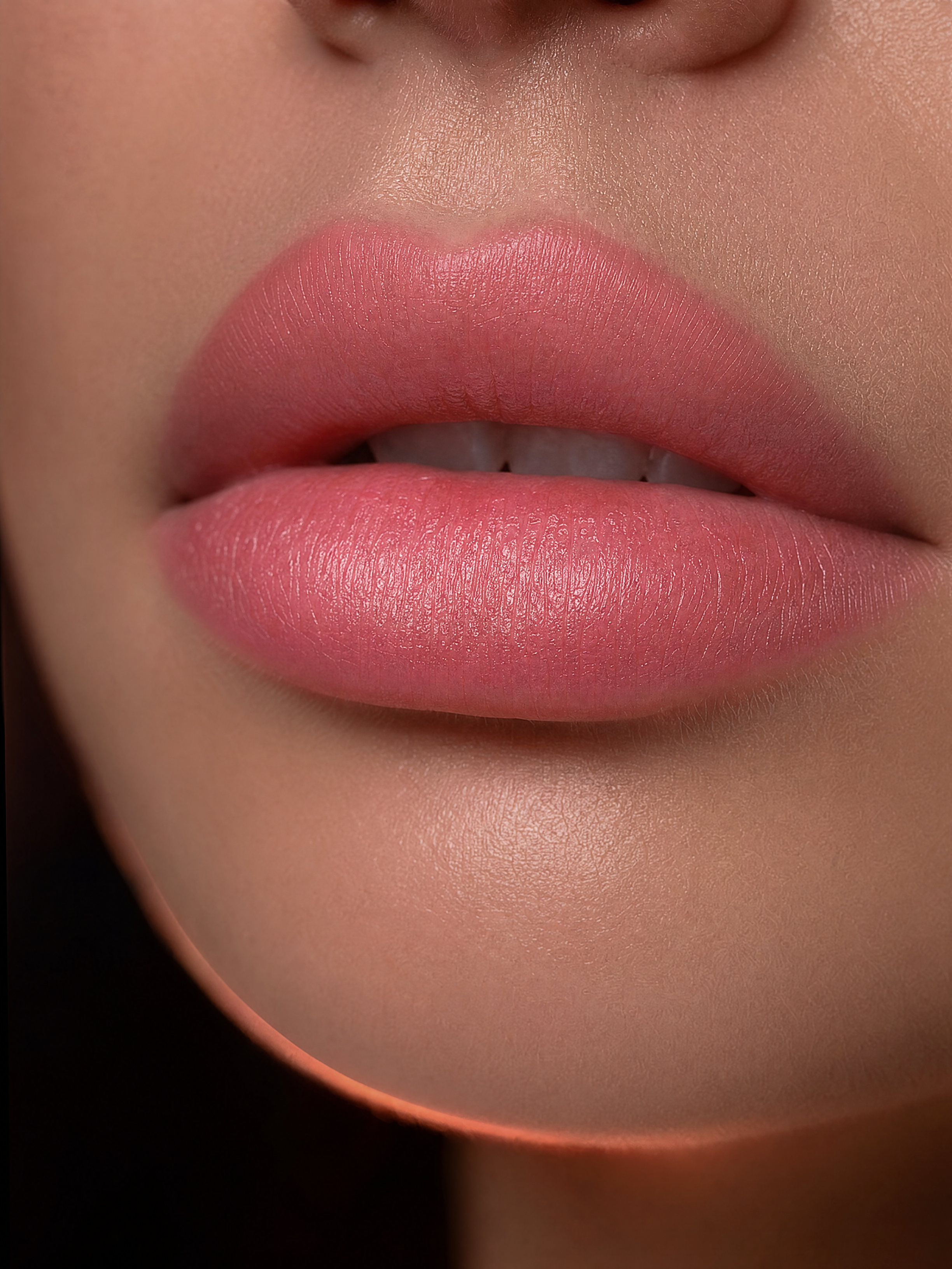 Close-up of beautiful lip blushing semi-permanent makeup